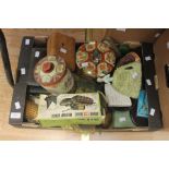 A collection of assorted items including tins, tea cosy, ebony mirror, Airfix model, boxes, ebony