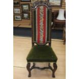 A Victorian Irish carved oak hall chair, carved floral top, tapestry and velvet back and seat,