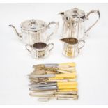 An EPNS tea service comprising tea and coffee pot, ,milk jug and sugar bowl, engraved patter,