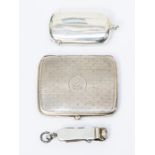 An Edwardian silver cigarette case, engraved with dot design and central circular cartouche with