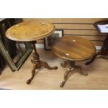 Two 19th Century Victorian round wine tables on tripod legs one with twist mechanism
