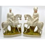 A pair of late 19th Century Staffordshire figurines on horse back