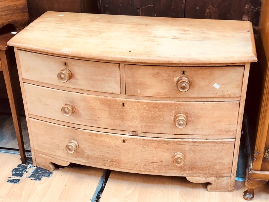 ****AUCTIONEER TO ANNOUNCE LOT WITHDRAWN****A 19th Century bow front chest of two over two