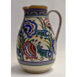 Impressive Poole Pottery jug, traditionally decorated with floral design, marked to base, 37 cms