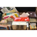 Collection of vintage tins and travel maps