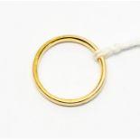 An 18ct gold wedding band, width approx. 2mm,  size 'M', weight approx 3.2gms