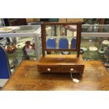 An early 19th Century mahogany dressing table mirror