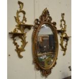 A Mirror and a pair of gilt shelves.