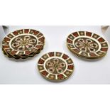 Ten Royal Crown Derby Imari 1128 pattern plates, comprising four wavy edge cabinet plates, each of