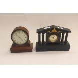 A Jurghans brass cased carriage clock with musical chime AF together with another mantel clock, with