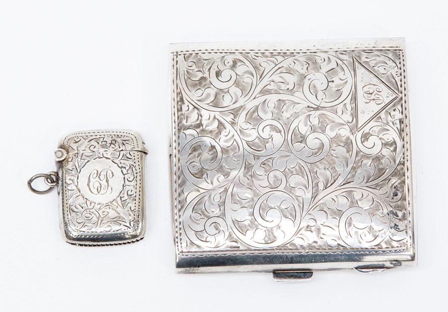 A silver cigarette case and a vesta case, Birmingham 1923, 4.20 ozt approx