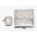 A silver cigarette case and a vesta case, Birmingham 1923, 4.20 ozt approx