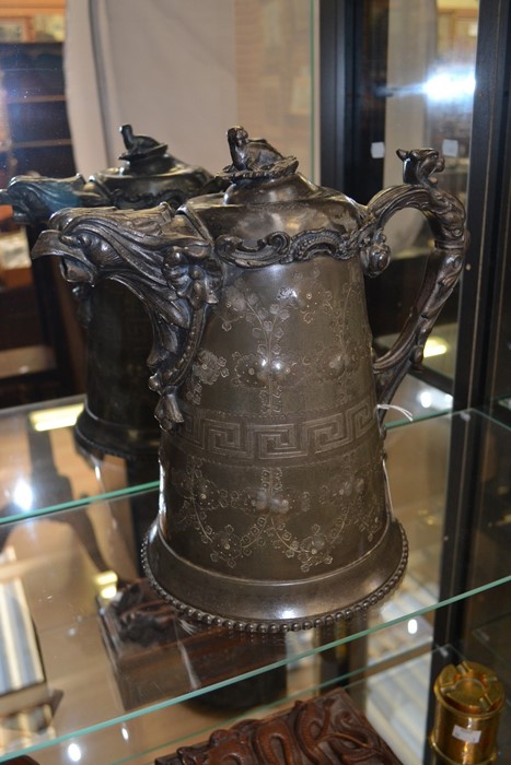 A late 19th Century American coffee pot in pewter, with an eagle spout design
