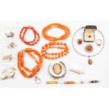 A collection of silver and white metal jewellery to include rings, collar, along with carnelian