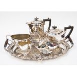 Plated tray with four piece silver plated tea set and sugar caddy