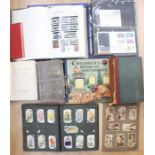 A box of assorted stamp albums, first day covers, Mrs Beetons Book of Household Management,