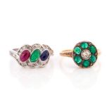 An emerald, sapphire and diamond cabochon set ring, unmarked white metal assessed as platinum,