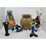 A Studio pottery vase by Alan Ward; Wedgwood black basalt vase; Poole dolphin; Murano glass clown;