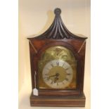 An early 19th Century rosewood bracket clock, by J M Clark, shaped top, arch glazed door, bras