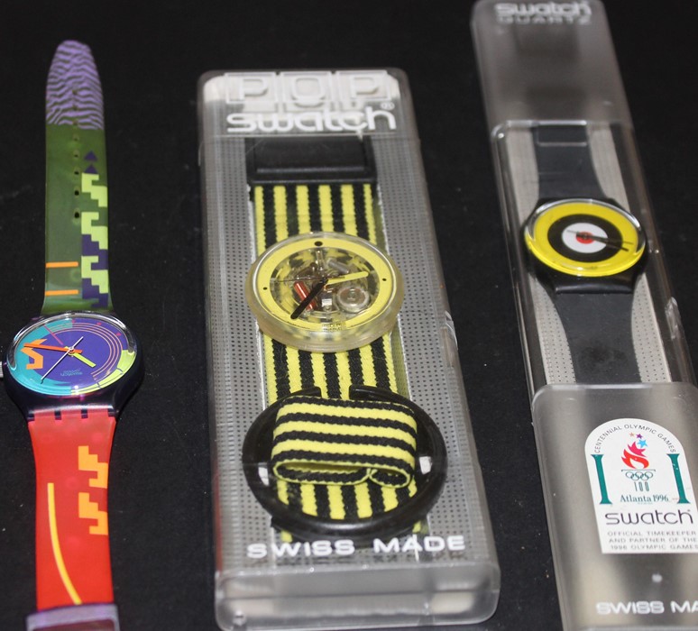 Three various Swatch quartz wrist watches, including a POP Swatch. (3)