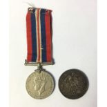 WW2 British War Medal complete with original ribbon along with a 1893 Silver Crown.