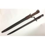 WW1 US P17 Enfield Bayonet. 43cm long fullered single edged blade maker marked "Remington" and dated