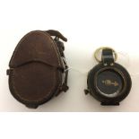 WW1 British Compass complete in leather case. Marked with Broad Arrow and F-L. Serial number