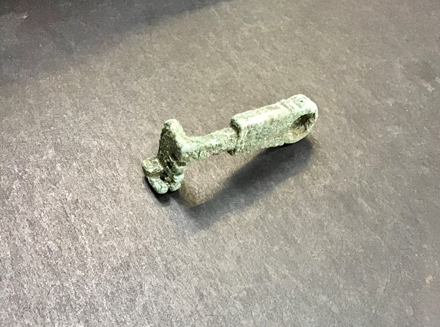 A Roman bronze key, Circa AD 44-200. A complete key formed of a sub-rectangular body with integral