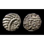 Anglo-Saxon Silver Sceattas Series E Obverse: Degenerate head enclosing, line of pellets, annulet