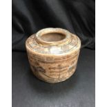 An antiquities pot. (7cm high 9cm wide)