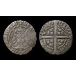 Henry V Silver Penny Obverse: Crown facing bust, mullet to left of crown, broken annulet to right.