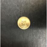 1887 22ct gold half sovereign.