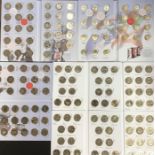 Eight Royal Mint Coin Hunt albums, containing 2 x £2 albums (31 coins in  each) £1 album (24 coins),