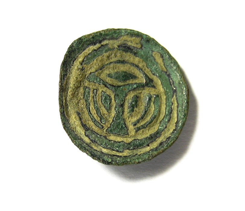 Early Anglo-Saxon Button Brooch, Circa AD 480-550. The brooch is circular in plan, demonstrating a