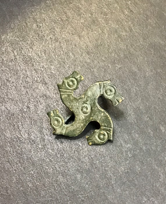 Roman brooch Bronze Zoomorphic Brooch. Stylised Swastika shaped-brooch, Circa 3rd century AD. The