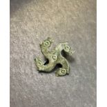 Roman brooch Bronze Zoomorphic Brooch. Stylised Swastika shaped-brooch, Circa 3rd century AD. The