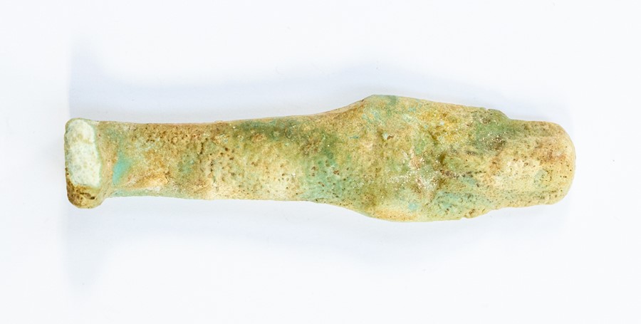 An Egyptian Ptolemaic Faience Shabti, Circa 305-30 BC. Size:  9.5 cm. Note: In ancient Egypt,