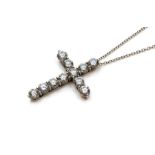 Tiffany & Co - a diamond set Tiffany & Co platinum cross pendant, with eleven round brilliant cut