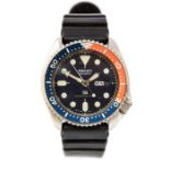 Seiko - a gentleman's Seiko divers 150 M quartz wristwatch, black dial with dot hour markers, day