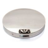 Georg Jensen - a sterling silver Georg Jensen oval compact, with raised stylised bud and scrolls,