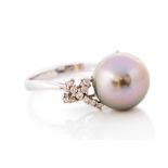 A Tahitian pearl and diamond 18ct white gold ring, the cultured pearl measuring approx 11.2mm, set