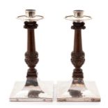 A pair of Arts and Crafts silver and oak candlesticks, A.E.Jones Birmingham 1914, approx 21.5cm