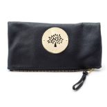 Mulberry - a Mulberry Daria clutch bag in black leather, gold tone signature tree plaque, fold
