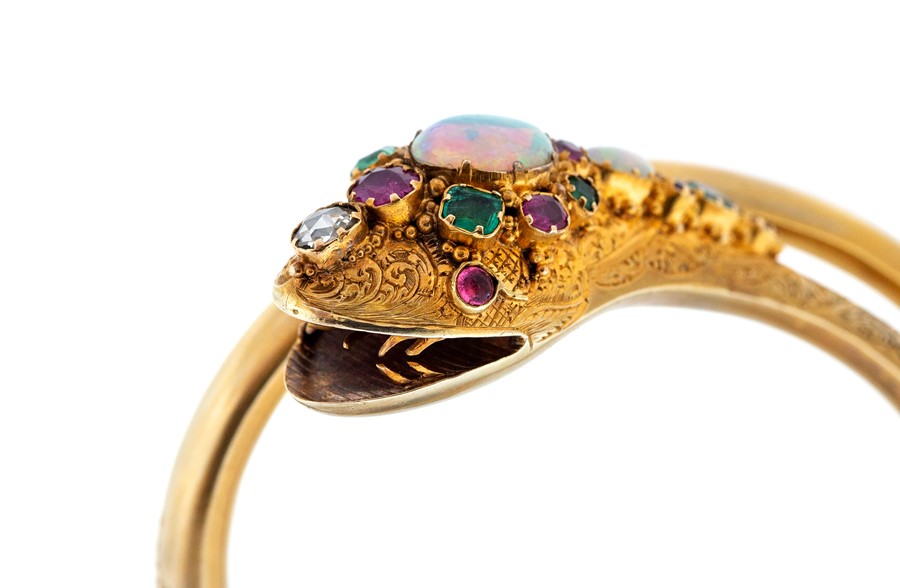 A Victorian opal, ruby, emerald and diamond set serpent bangle, coiled form comprising oval cabochon - Image 10 of 12