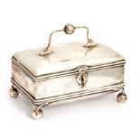 An early 20th Century Russian silver jewellery casket, rectangular cushion shaped, the cover with