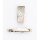 A modern silver tie clip in the form of Zeppelin on plain back, by JG?, London, 1990 together with