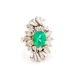 A Garrard & Co emerald and diamond ring, circa 1950's/early 60's, the Columbia oval cut emerald