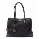 Prada - a black nylon Prada tote, trimmed in leather, two shoulder handles, one large internal