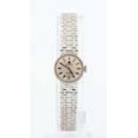 Tissot - a ladies 1970's 9ct white gold Tissot wristwatch, circular 15mm dial with baton indicators,