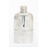 A Victorian silver mounted hip flask, the glass bottle silver mounted in two sections, the fixed top